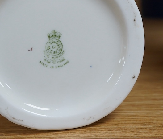 A graduated set of four Royal Worcester blue and white jugs, tallest 11cm. Condition - good.